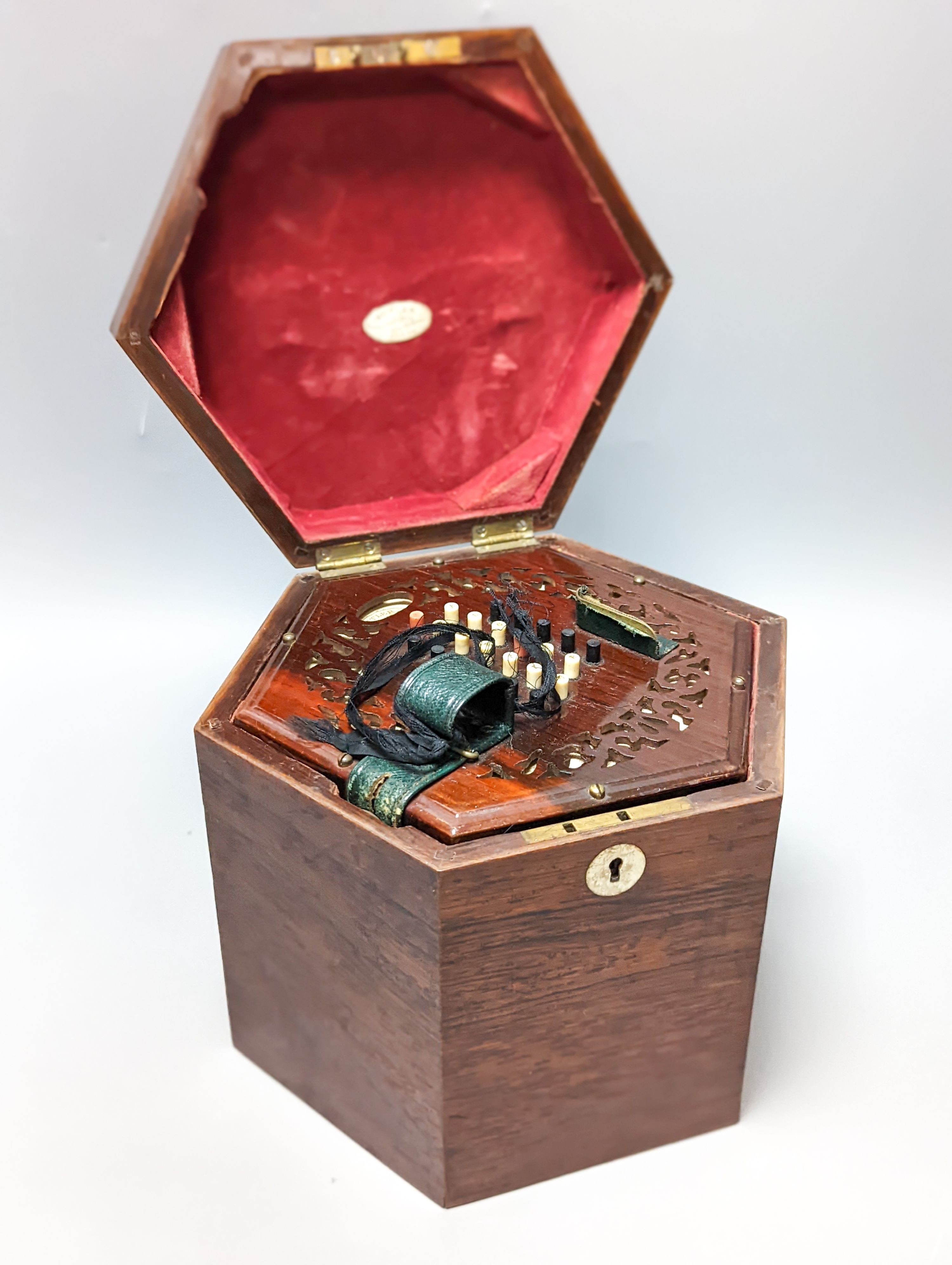 A 19th century rosewood 48 button cased concertina, by Butler, Haymarket, London, rosewood box, damage